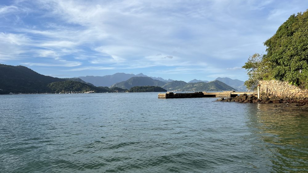 A calm bay ringed by mountains