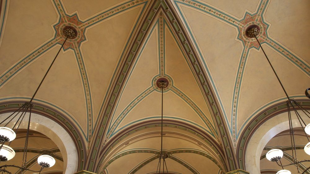 Vaulted ceiling and chandeliers of Cafe Central in Vienna