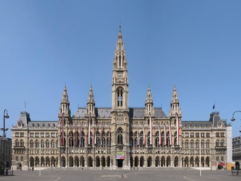 The neo-Gothic Vienna City Hall, Wiener Rathaus, under a blue sky