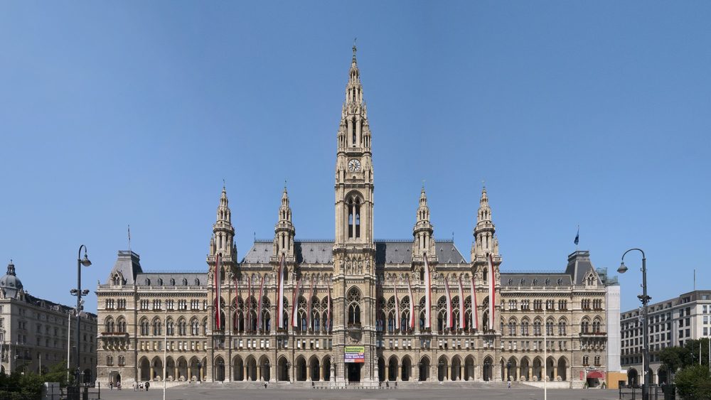 The neo-Gothic Vienna City Hall, Wiener Rathaus, under a blue sky