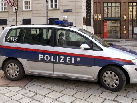 Vienna police car parked in a city square