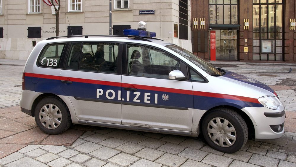 Vienna police car parked in a city square