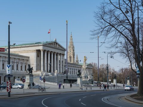 Vienna Parliament on the Ringstrasse with the City Hall tower behind