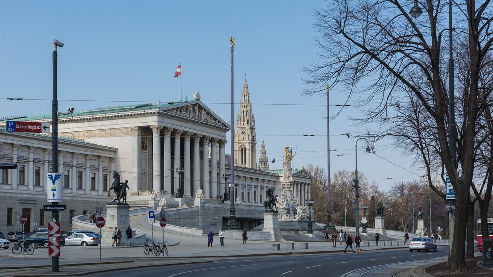 Vienna Parliament on the Ringstrasse with the City Hall tower behind