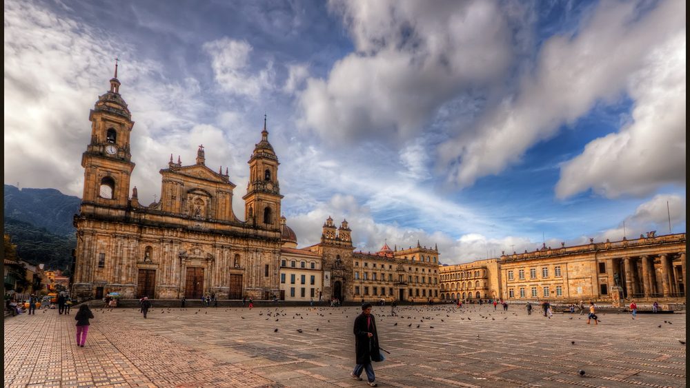 Plaza de Bolivar in Bogota with the cathedral under dramatic clouds