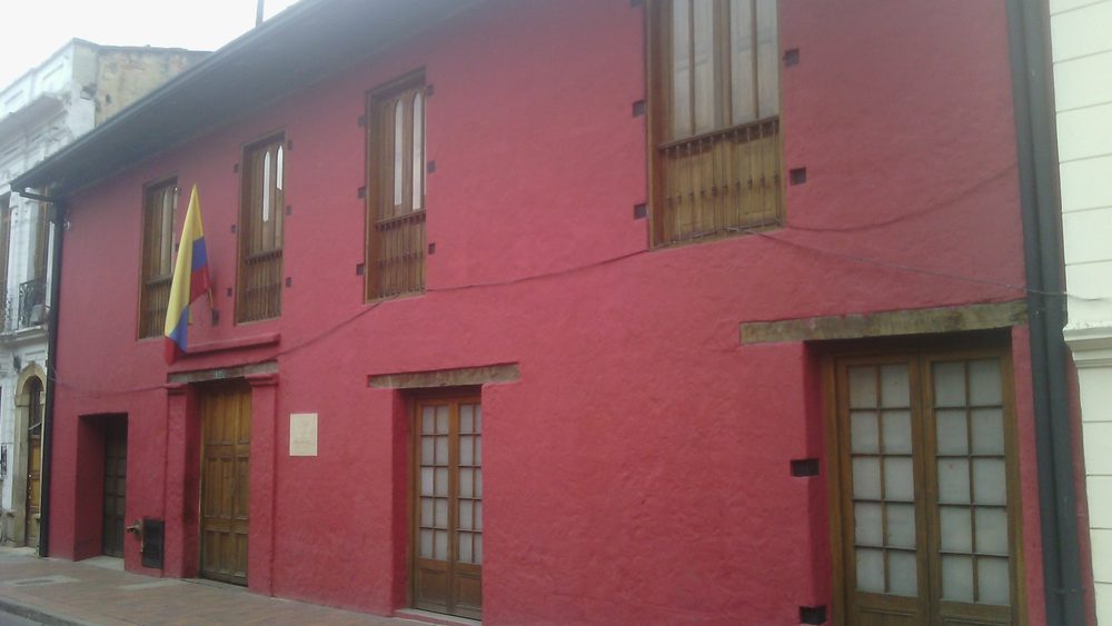 Red colonial facade of a government ministry building in Bogota's historic center