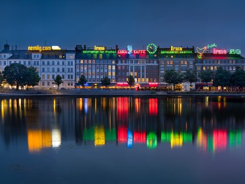 Copenhagen lakes reflecting the lit city skyline at night