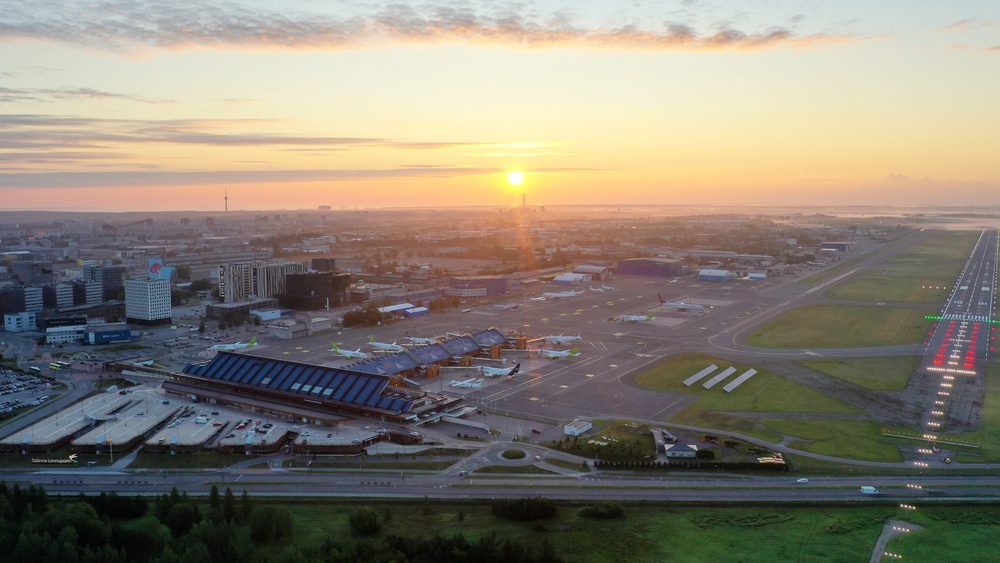 Passenger terminal and runway at Tallinn Airport at sunrise, Estonia