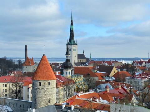 Red rooftops and church spires of the old town of Tallinn