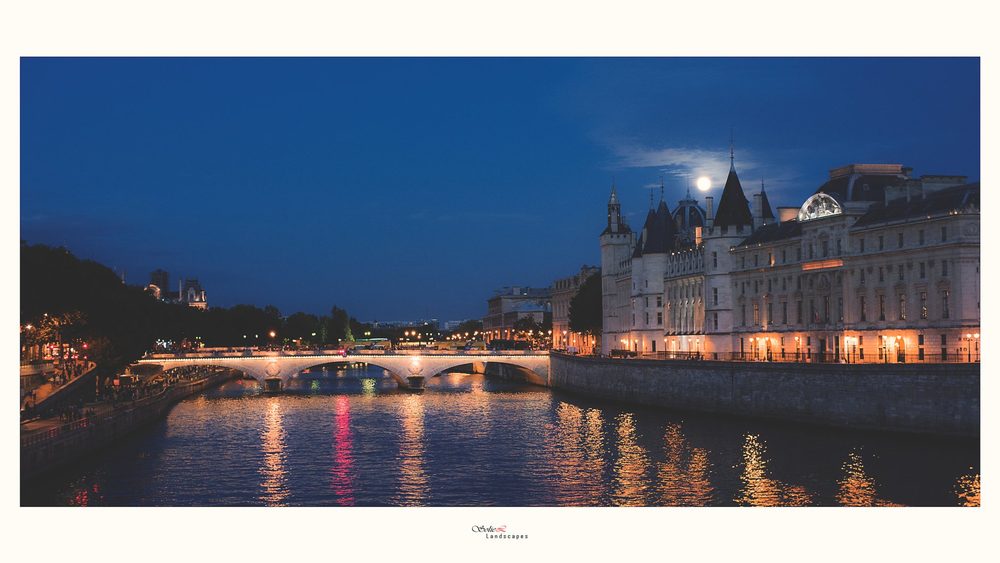 The Seine and the Conciergerie in Paris at night