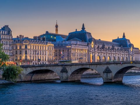 Pont Royal and the Musee d'Orsay on the Seine in Paris at dusk