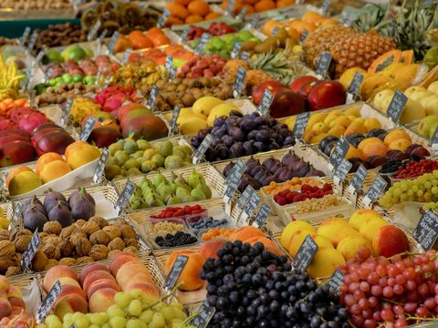 Fruit stall piled with produce at the Viktualienmarkt in Munich