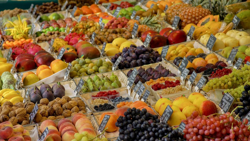Fruit stall piled with produce at the Viktualienmarkt in Munich