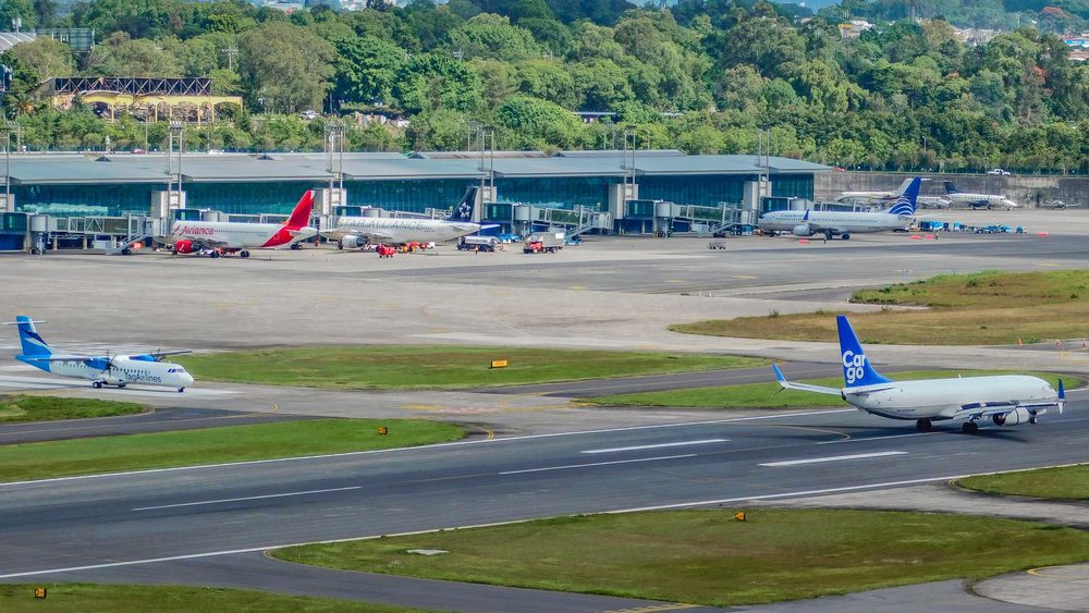 La Aurora International Airport apron and terminal in Guatemala City with parked airliners