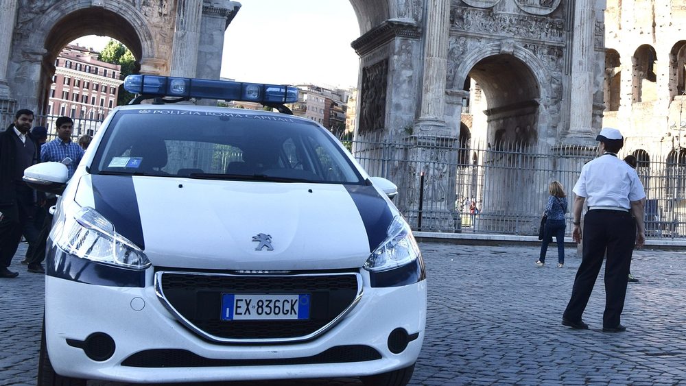 Polizia Locale di Roma Capitale patrol car on a street in Rome, Italy