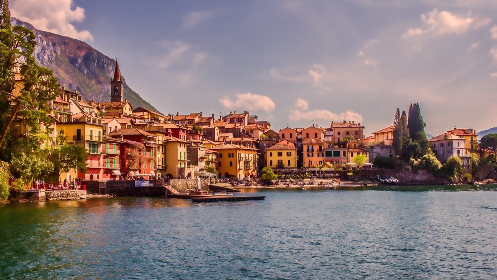 Pastel houses of Varenna on the shore of Lake Como under the mountains