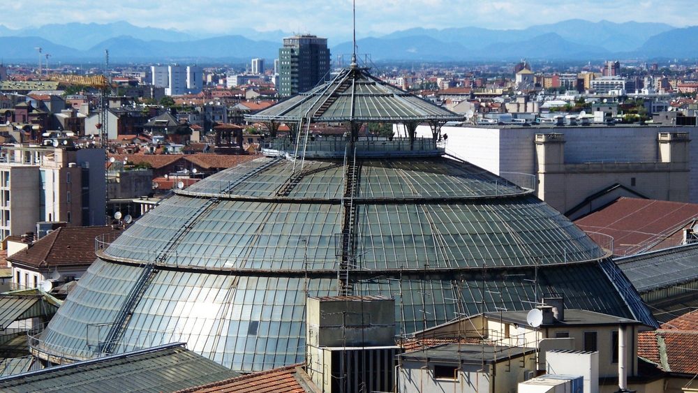 The glass dome of the Galleria Vittorio Emanuele II seen from the rooftops of central Milan