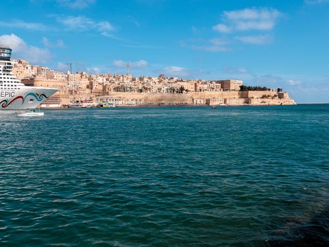 Valletta skyline and Grand Harbour under a clear sky