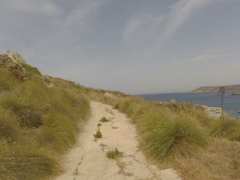 Narrow country road near the coast in Mgarr, Malta