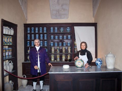Historic pharmacy display inside the Sacra Infermeria in Valletta