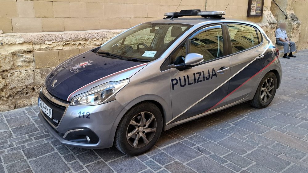 Malta police car parked on a Valletta street