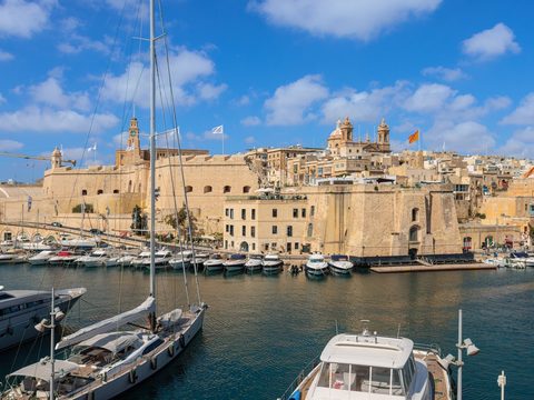 Valletta harbour with yachts and old stone bastions