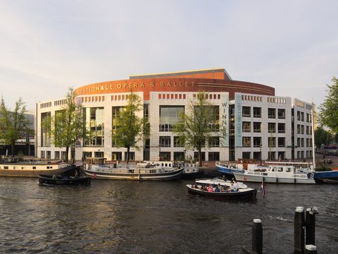 The Stopera, Amsterdam city hall and opera house, on the Amstel