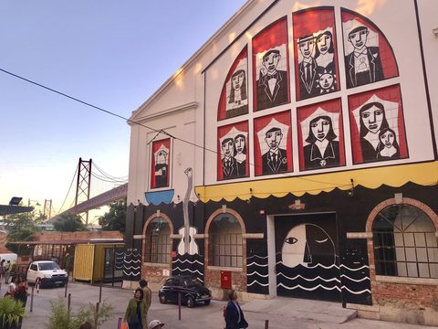 Painted facade at LX Factory in Lisbon near the 25 de Abril bridge