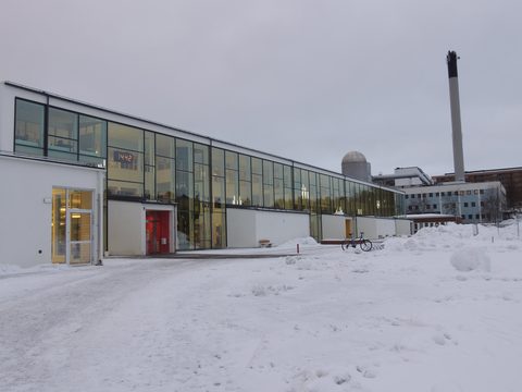 Modern Nyboda school building in Stockholm after a snowfall