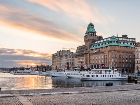 Nybrokajen quay at Blasieholmen in Stockholm at sunset