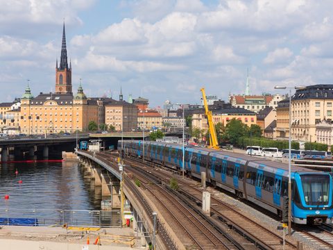 Commuter train crossing near Gamla Stan in Stockholm