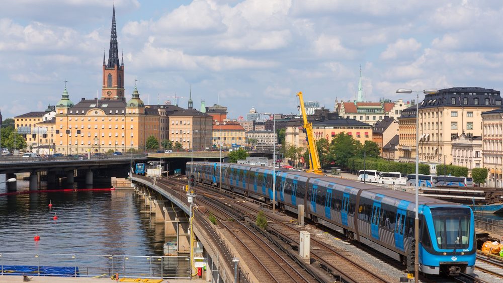 Commuter train crossing near Gamla Stan in Stockholm
