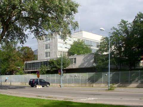 US Embassy building in Stockholm behind its security fence