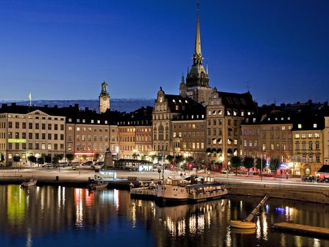 Gamla Stan, Stockholm's old town, reflected in the water at dusk