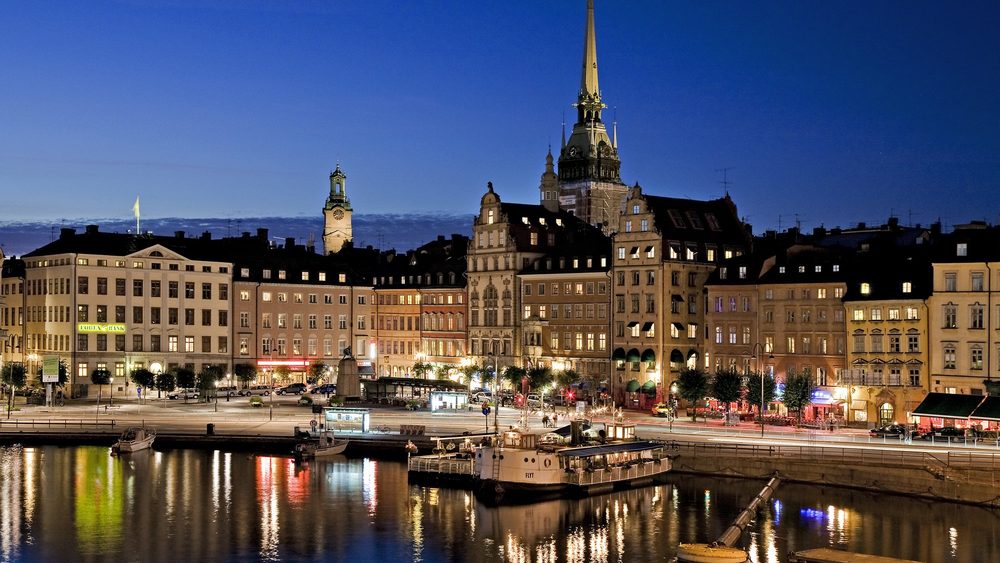 Gamla Stan, Stockholm's old town, reflected in the water at dusk