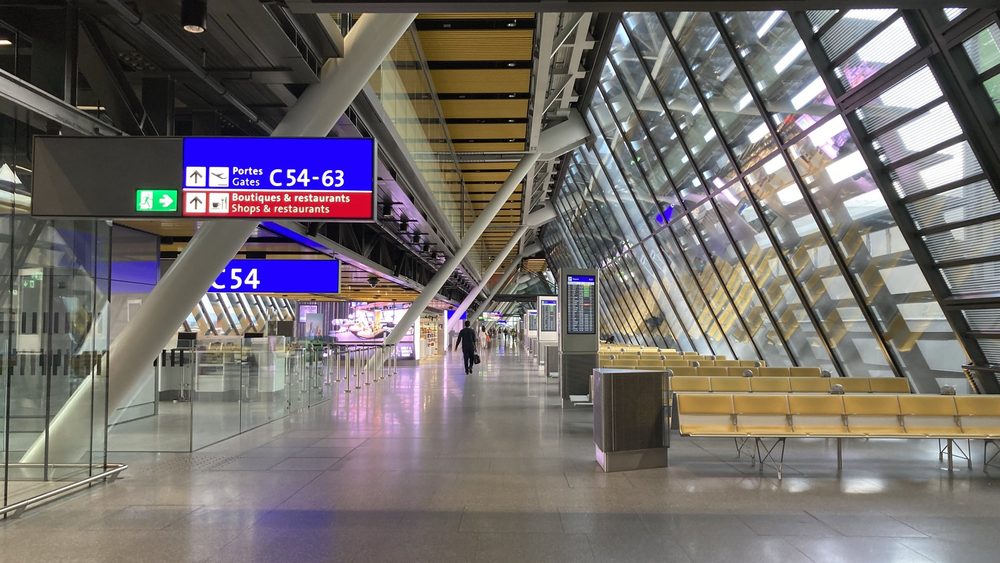 The glass and steel east wing pier of Terminal 1 at Geneva Airport