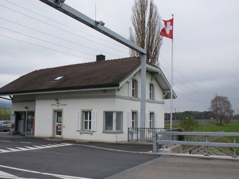 Swiss customs house at the Kriessern border crossing with the Swiss flag