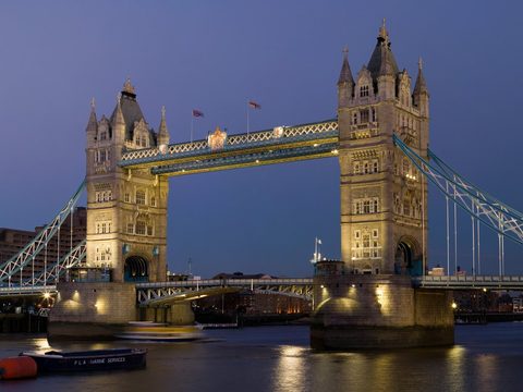 Tower Bridge over the River Thames at dusk in London, United Kingdom